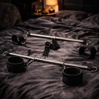 Bondage equipment on a bed in a dimly lit room